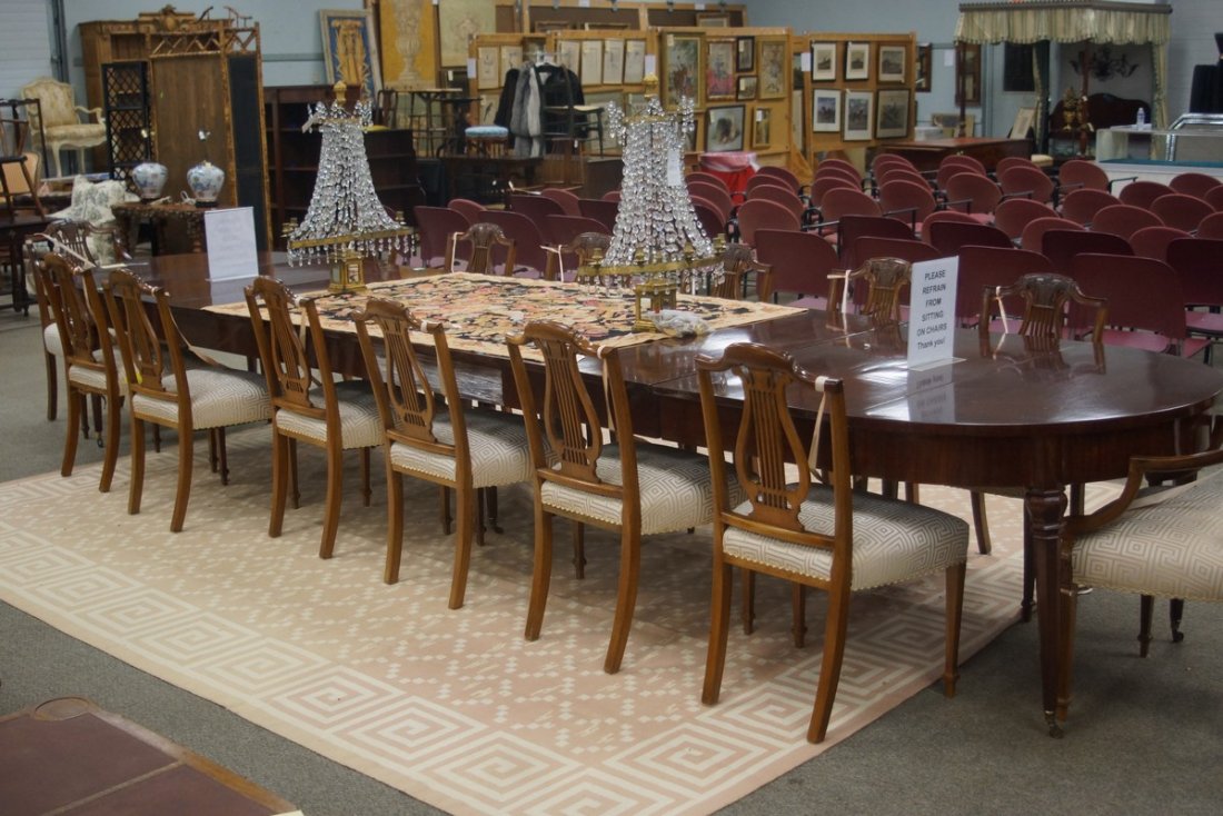 Louis Philippe Mahogany Extension Dining Table, 19th c,: Louis Philippe Mahogany Extension Dining Table, 19th c, circular top, octagonal tapering legs ending in brass cap casters. 31" h, 49" d