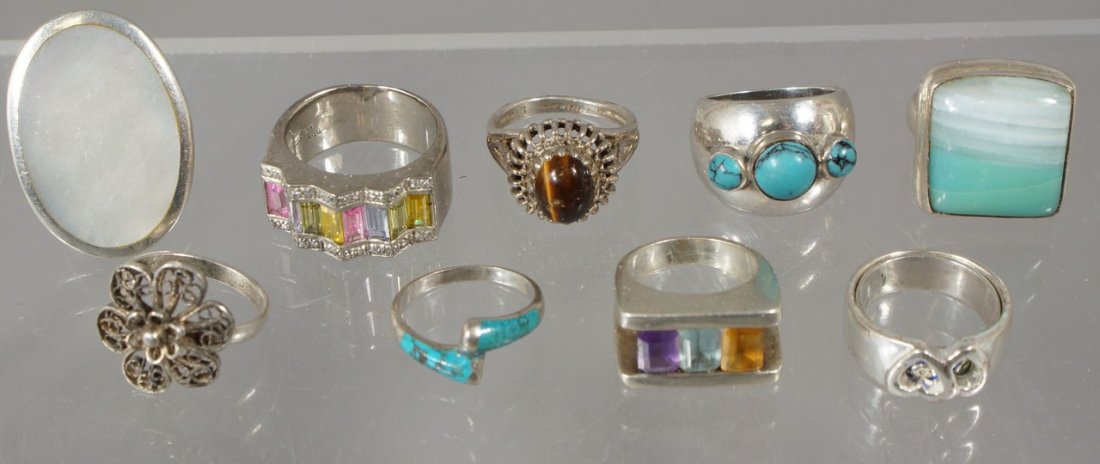 9 sterling silver rings, turquoise and other stones,: 9 sterling silver rings, turquoise and other stones, 2.5 TO