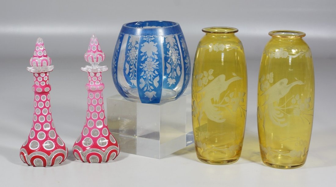 (5) pcs Bohemian glass, Pr amber engraved vases, exotic: (5) pcs Bohemian glass, Pr amber engraved vases, exotic birds on a branch, 8" h, unmarked; pr overlay cut to clear perfume bottles, one stopper damaged, 8" tall, and a pale blue and clear engraved vas