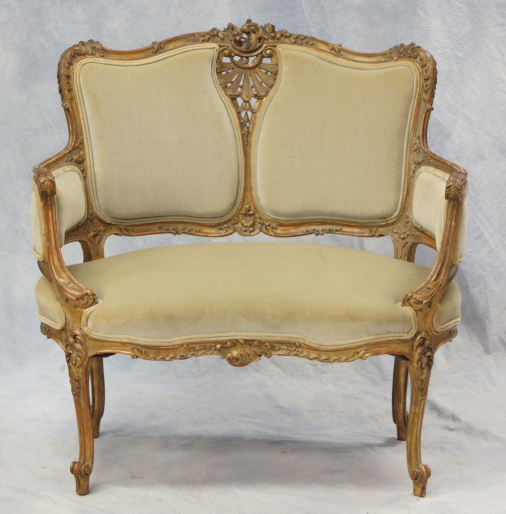 Carved and gilt Louis XV style double back settee,: Carved and gilt Louis XV style double back settee, green velvet upholstery, 36" w, 36 1/2" h, pleasing worn surface