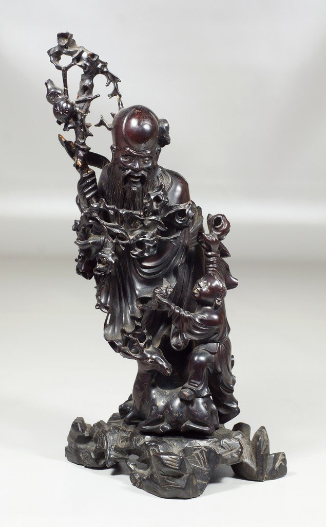 Chinese carved hardwood figure of a man with young boy,: Chinese carved hardwood figure of a man with young boy, 11 1/4" h, restoration to staff