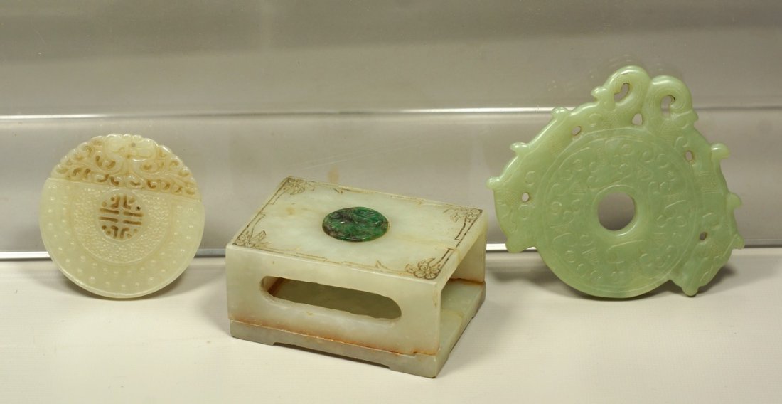 3 Chinese Hard Stone Carvings, a circular pendant, an: 3 Chinese Hard Stone Carvings, a circular pendant, an archaistic pendant and a match box, largest 3" wide