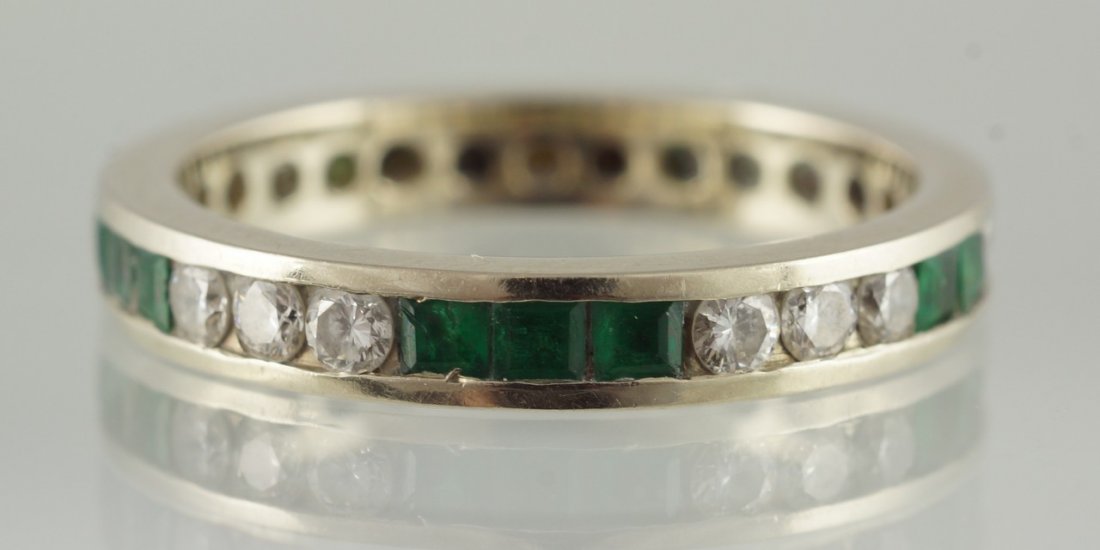 Platinum diamond and emerald eternity band, channel set: Platinum diamond and emerald eternity band, channel set w/15 round diamonds and 14 square emeralds (missing one stone), size 7 1/2, 1.9 dwt