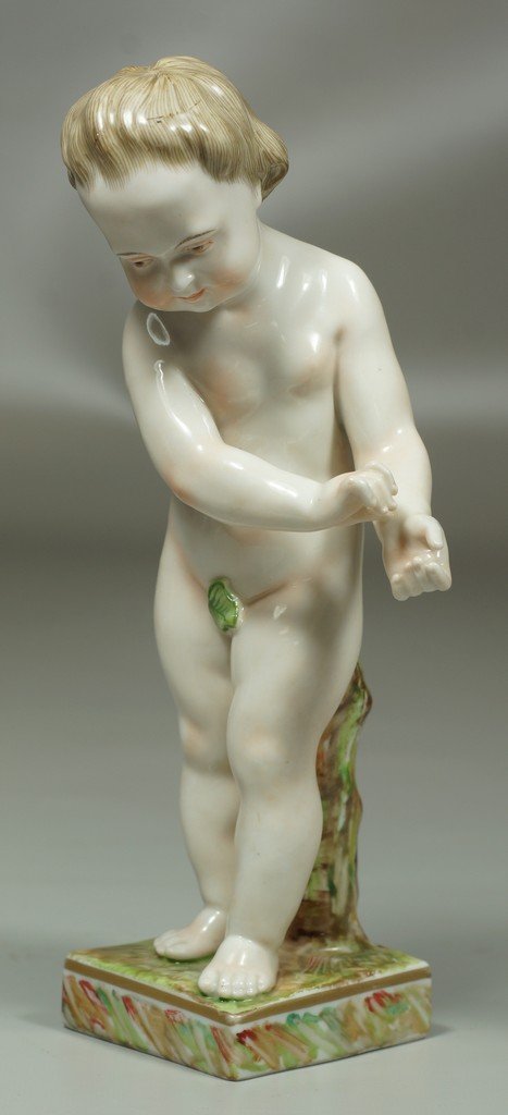 Continental Porcelain figure of a young boy, mark to: Continental Porcelain figure of a young boy, mark to base, 7-3/4" high