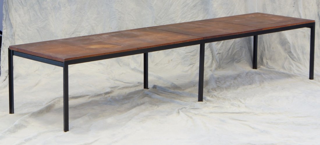 Knoll rectangular coffee table with black painted steel: Knoll rectangular coffee table with black painted steel legs and four panel segmented top, paper label on underside, 16" h, 20" d, 80-1/2" long