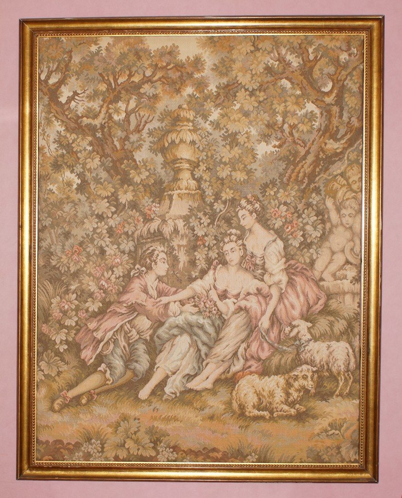 Gilt Framed Machine Made Wall Tapestry depicting a: Gilt Framed Machine Made Wall Tapestry depicting a romantic scene in the garden, 54" x 42"
