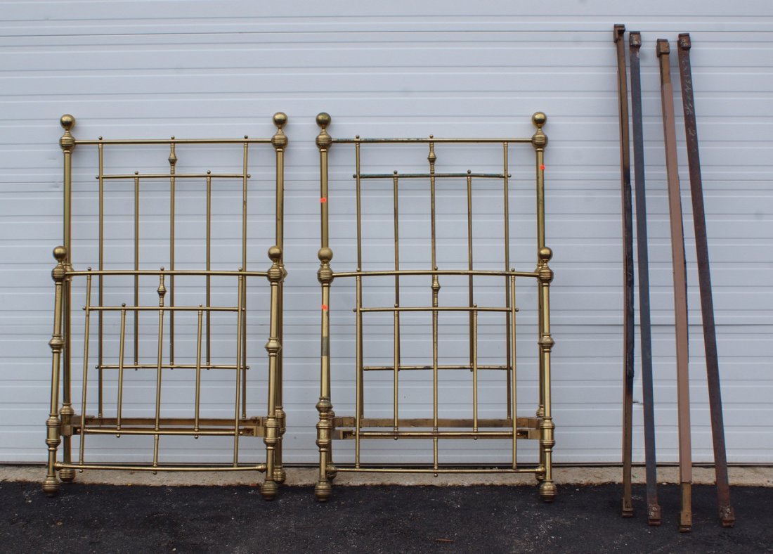 Pr brass twin beds, c 1900, 36" wide, side rails: Pr brass twin beds, c 1900, 36" wide, side rails extended to 76" long, 5 brass balls missing, headboard finial repaired