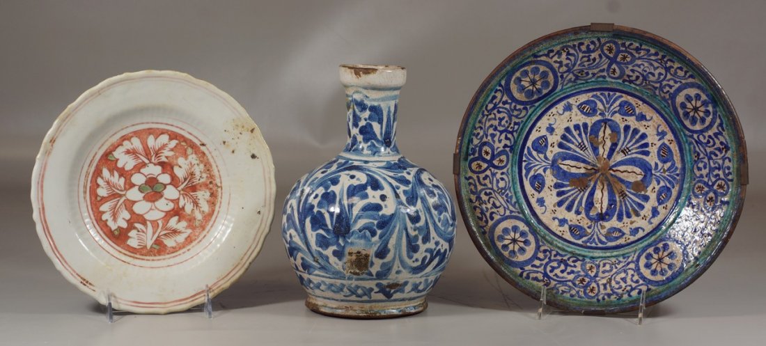 3 pcs of Dutch or Continental Faience to include a: 3 pcs of Dutch or Continental Faience to include a bottle form vase lacking a handle, a blue and green charger and a coral and cream plate, largest 10-1/2" diameter