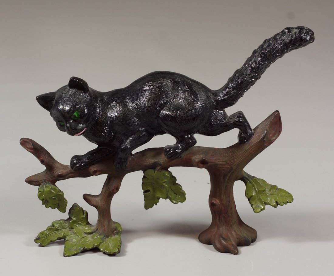 Painted cast iron cat doorstop, 9" w: Painted cast iron cat doorstop, 9" w