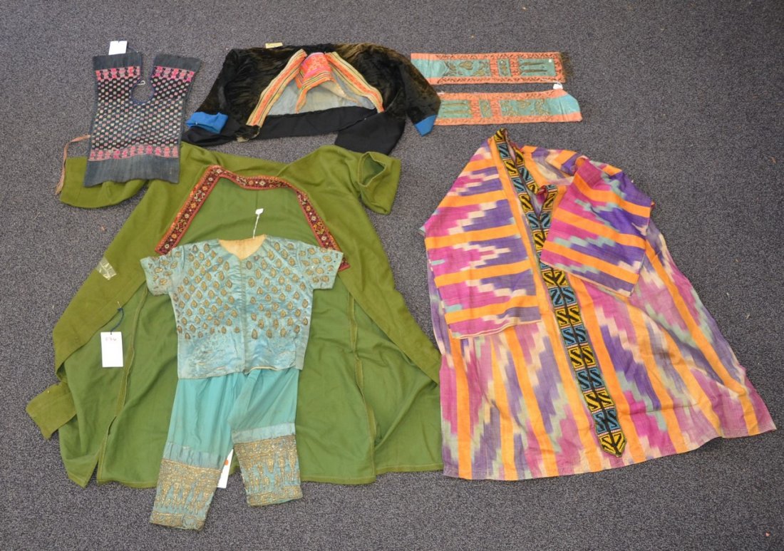 (5) Asian costumes, including: Early 20th Century,: (5) Asian costumes, including: Early 20th Century, beaded/sequined child's outfit, Thai or Indonesian; Crushed velvet embroidered child's jacket, 20th Century, Central Asia; Multi-colored embroidered 