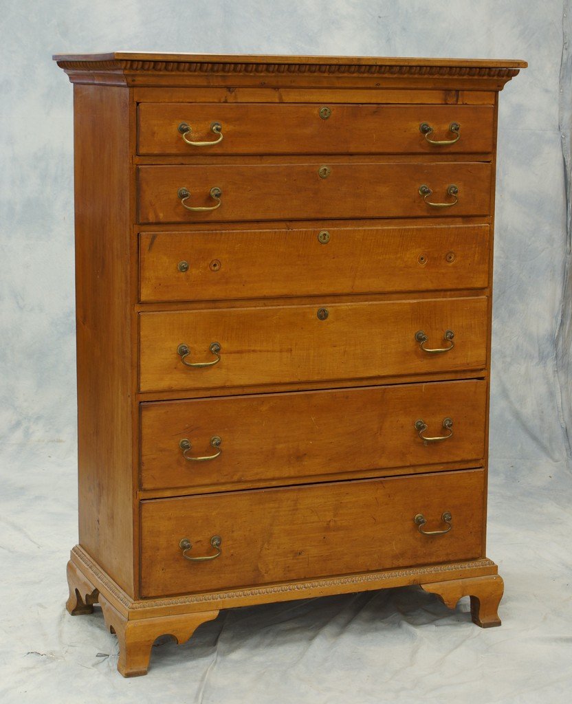 Chippendale 6 drawer figured maple New England tall: Chippendale 6 drawer figured maple New England tall chest, replaced brasses and feet, a later finished board on top, 36" w, 55" h, late 18th century, one drawer bottom replaced