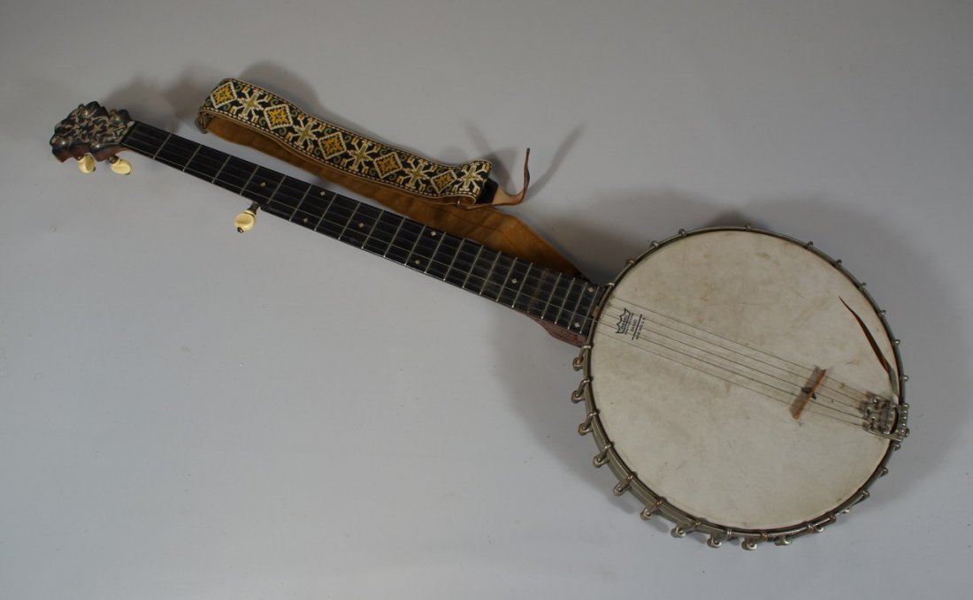 SS Stewart Phila Model 5 Thoroughbred Special banjo: SS Stewart Philadelphia Model 5 Thoroughbred Special 5 string banjo by with birds eye maple and inlaid with mother of pearl inlaid peg head, Remo Weatherking head torn, 35" long, SN 18836, 2 round hoo
