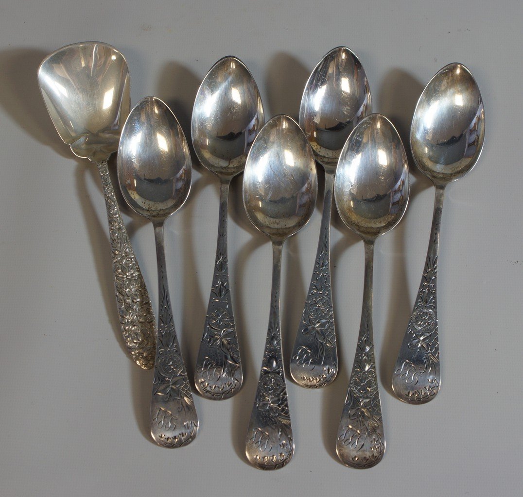 6 engraved bright cut sterling silver teaspoons by: 6 engraved bright cut sterling silver teaspoons by Whiting, sold by B,B, & B, LLL mono, with a floral repousse sugar shell by Mauser, 4.69 TO