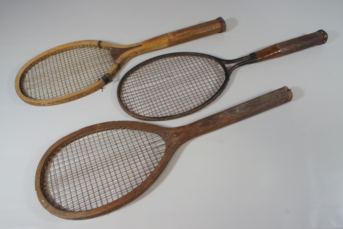 3 Vintage tennis rackets, to include 2 fully strung: 3 Vintage tennis rackets, to include 2 fully strung wooden shaft with nail tacking, one with partial emblem, and the other wood with steel frame, circa 1960s