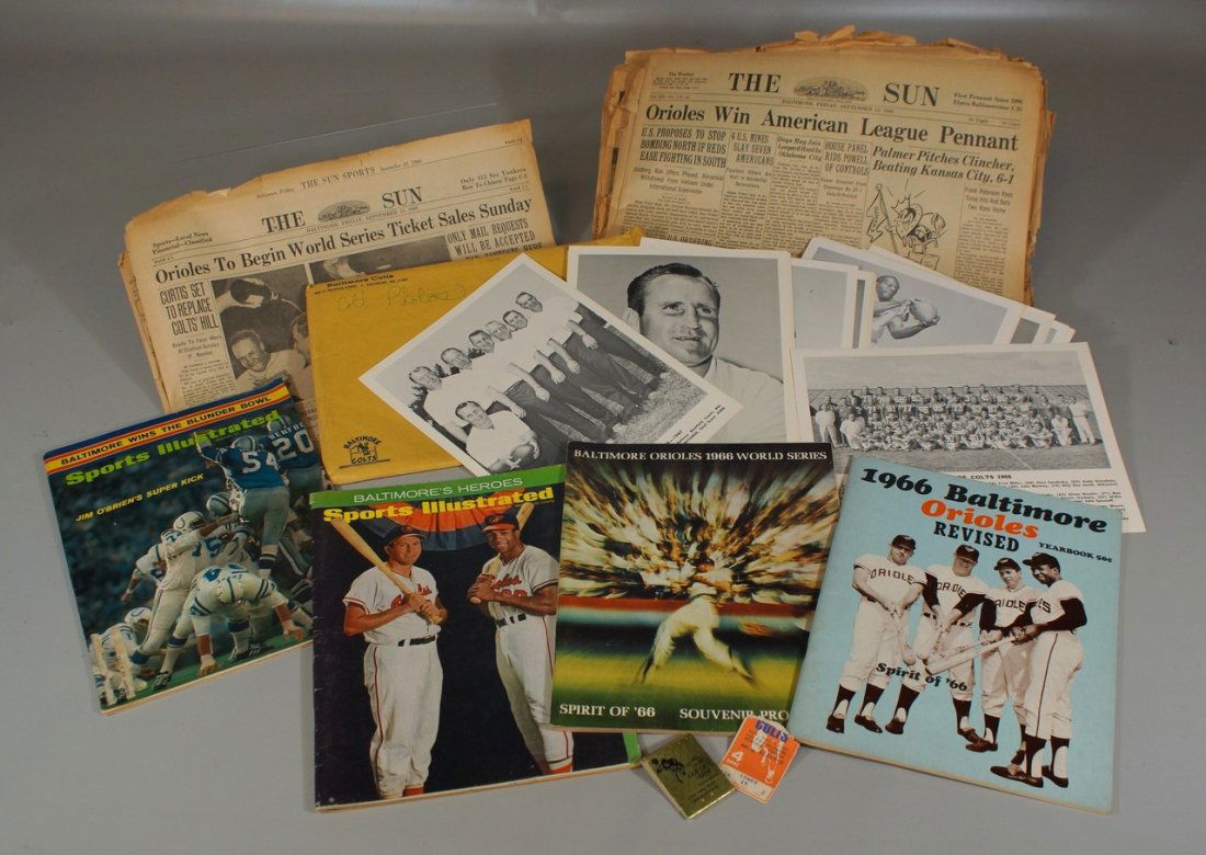 Baltimore Ephemera Lot to include Baltimore Orioles: Baltimore Ephemera Lot to include Baltimore Orioles 1966 revised yearbook; World Series program; Sports Illustrated Baltimore cover, 1966 Baltimore Colts 8 x 10 black and white picture pack with origi