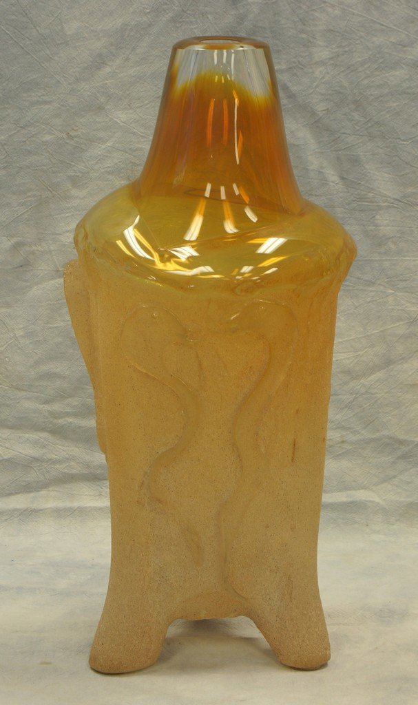 Neal Drobnis, American, RI, late 20th c, sand cast: Neal Drobnis, American, RI, late 20th c, sand cast glass sculpture, 3 footed vase with shaded amber top, 19 1/2" h