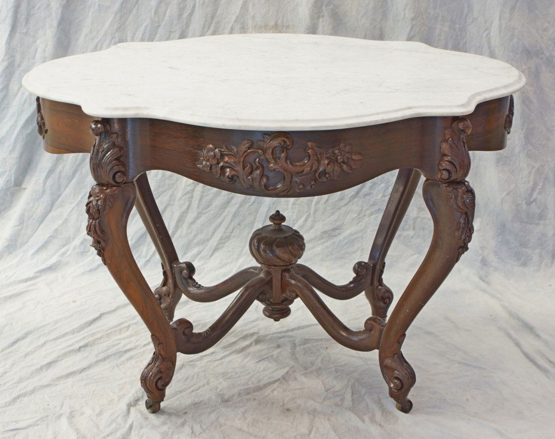 Victorian rosewood turtle shaped center table, Belter: Victorian rosewood turtle shaped center table attributed to John Henry Belter, original white marble top, 42" l, 33" w, 28-1/2" h. Please see "American Furniture of the 19th Century" by Eileen and Ric