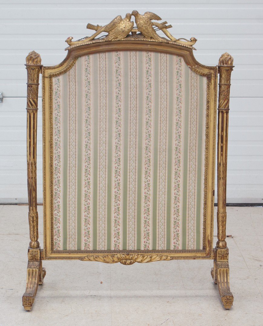 Carved and gilt Louis XVI French style fire screen,: Carved and gilt Louis XVI French style fire screen, lovebird crest, 45" h, 32" w, 19th c