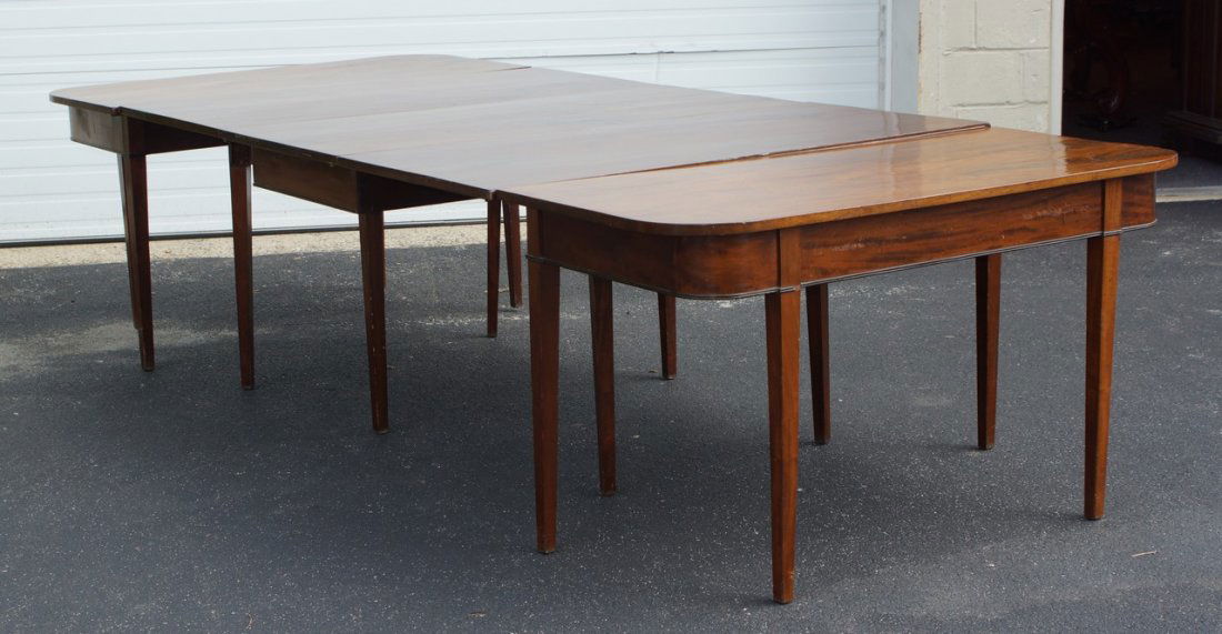 3-Part mahogany Hepplewhite dining table, center: 3-Part mahogany Hepplewhite dining table, center section with rectangular leaves, rectangular end sections with rounded corners, probably American late 18th c, missing clips, small pc of molding missi