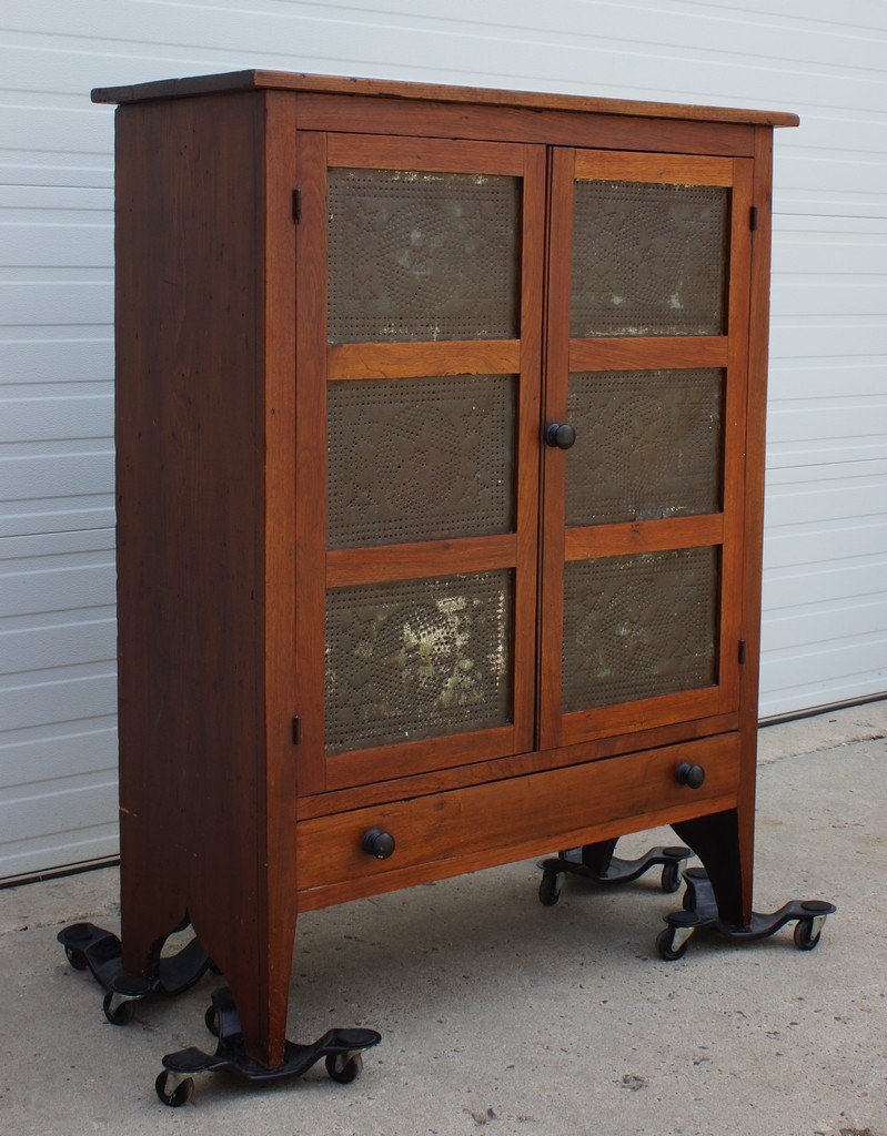 Walnut pie safe with pierced tin panels in front doors,: Walnut pie safe with pierced tin panels in front doors, solid ends, one long drawer, 35" h, 37-1/2" w, 16" d