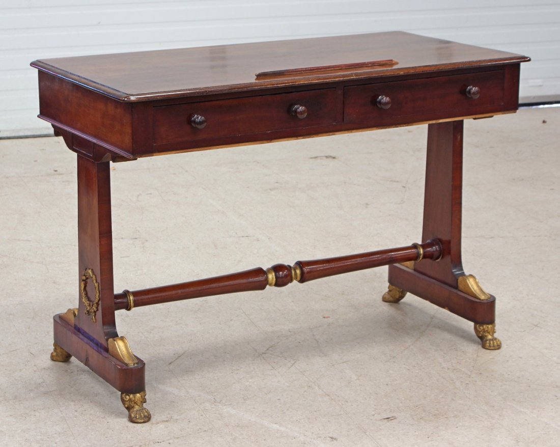 Carved & gilt mahogany Regency sofa table, 2 drawers,: Carved & gilt mahogany Regency sofa table, 2 drawers, rectangular molded top, ends of base with round gilt bronze wreath mounts, minor losses to veneer & edge moldings, 29-1/4" h x 42-1/2"w x 22" d