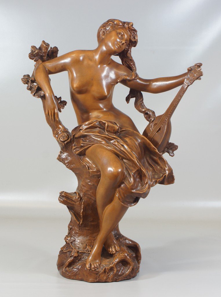 L Maoliassi, Italian, 19th/20th c, bronze patinated: L Maoliassi, Italian, 19th/20th c, bronze patinated pottery sculpture of a nude woman with mandolin, impressed signature and numbered 5627, 26" tall, no damage noted