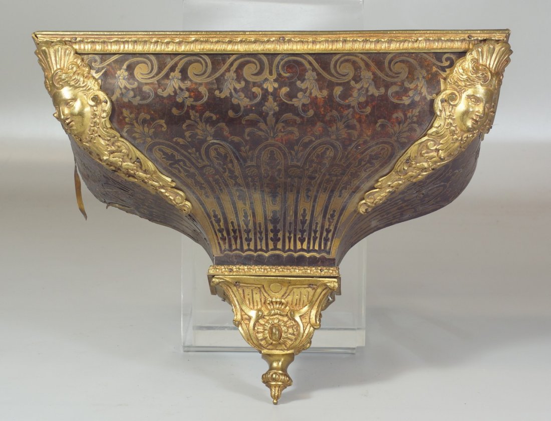 Bronze mounted boulle wall bracket, angel heads to: Bronze mounted boulle wall bracket, angel heads to corners, some inlay loose, 14 1/2" w, 10" h, 19th c, French