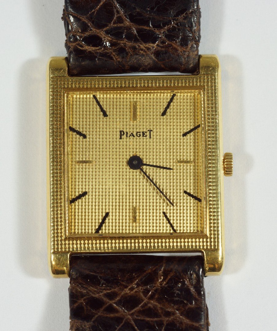 18K YG Piaget mans wristwatch, tank style case, 1 1/8": 18K YG Piaget mans wristwatch, tank style case, 1 1/8" x 7/8", runs when wound