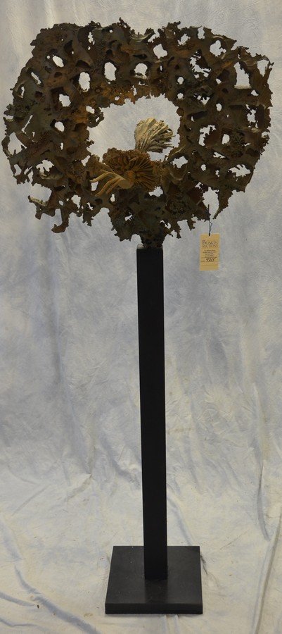 Grover Wulvern (Tom) Hendricks, American, b 1916,: Grover Wulvern (Tom) Hendricks, American, b 1916, "Swinging Hand", a bronze sculpture, 29" w, 24" h, on a black metal stand 44" high