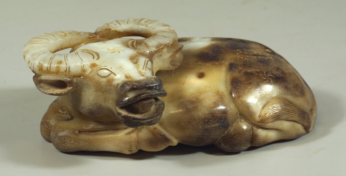 Chinese carved hardstone reclining ox with export seal: Chinese carved hardstone reclining ox with export seal to base, 6" wide