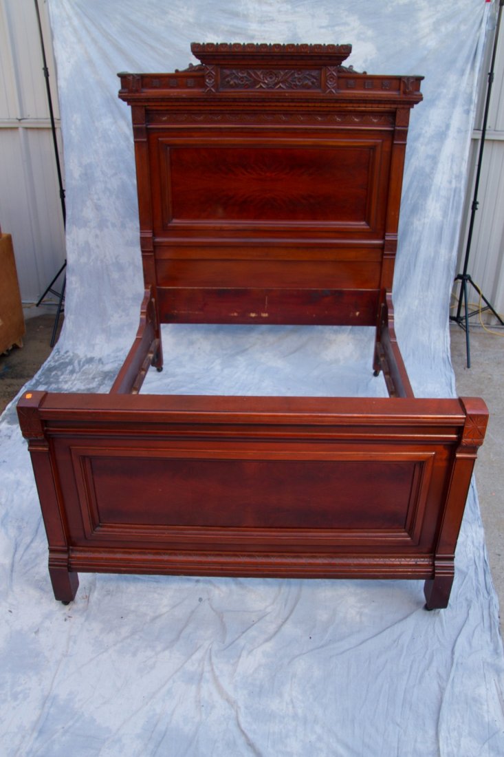 Victorian incised and carved bed 78"h x 60"w x 82" l: Victorian incised and carved bed 78"h x 60"w x 82" l (some loss to veneer) and Victorian 2/2 incised and carved cottage bureau with marble top and cheval mirror 93-1/2"h x 49-1/2"w x 21-1/2"d