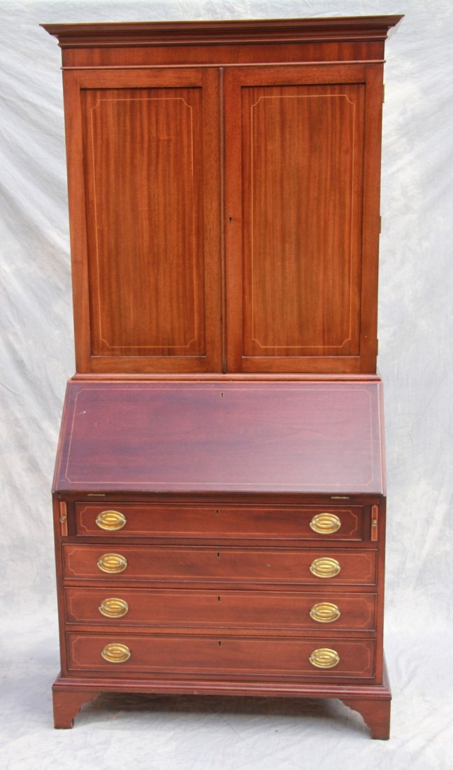 Biggs 2 pc Hepplewhite style secretary desk, Stratford: Biggs 2 pc Hepplewhite style secretary desk, Stratford finish, Model 2025, 3 secret compartments in interior, 81"h x 40-1/2"w x 22"d (some sun fade to doors; some scratches on top of base which are co