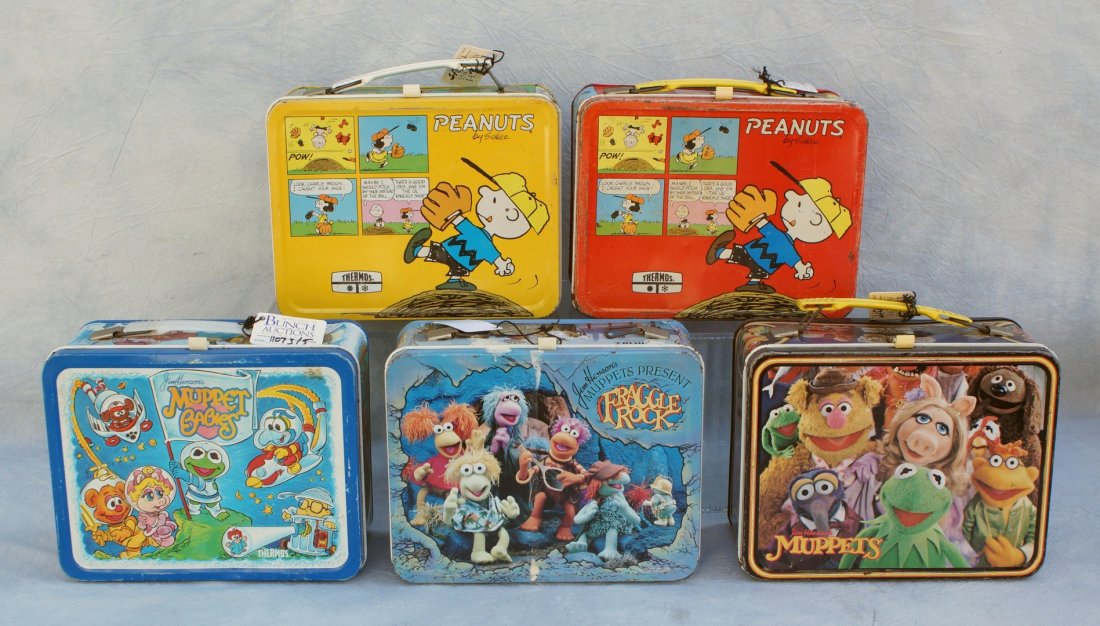 5 Tin lunch boxes, to include: 2 Peanuts, Muppets,: 5 Tin lunch boxes, to include: 2 Peanuts, Muppets, Fraggle Rock and Muppets Babies