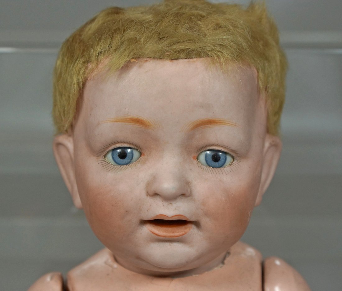 Kestner bisque head toddler doll, mold 211; blue glass: Kestner bisque head toddler doll, mold 211; blue glass sleep eyes, skin wig, plaster pate, condition is good, 13" tall