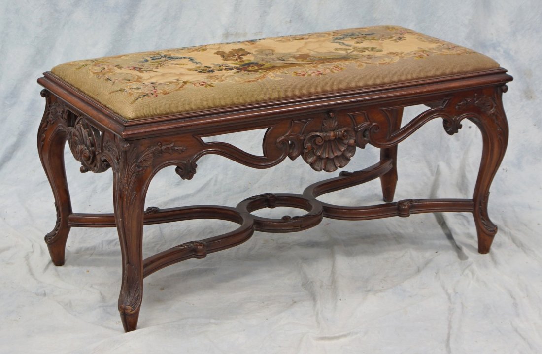 Carved mahogany French style window bench with scenic: Carved mahogany French style window bench with scenic needlework upholstered seat, some stains and losses, 40" x 19", c 1900