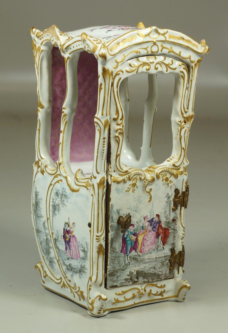 Continental Faience miniature sedan chair, ormolu: Continental Faience miniature sedan chair, ormolu hinges, chipping to top, 9 1/2" high