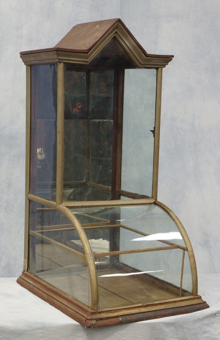 Oak and nickel framed candy store tower form display: Oak and nickel framed candy store tower form display cabinet, makers tag from FH Starling, Philadelphia, 40 1/2" h, 19" w, 24 1/2" d, left glass present but not attached; some damage to base; metal ri
