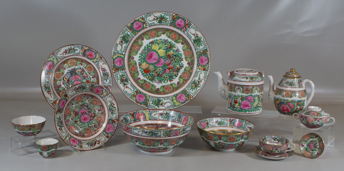 88 pcs Famille Rose porcelain dinnerware, decorated in: 88 pcs Famille Rose porcelain dinnerware, decorated in Hong Kong, c 1960-70, consisting of: 18 rice bowls, 16 handle-less teacups, 12 handles teacups, 11 saucers (1 chipped), 10 cream soup bowls, 8 li