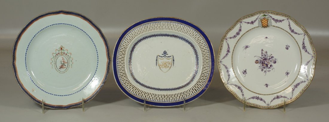 (3) Chinese export armorial plates; 2 are 9" diameter,: (3) Chinese export armorial plates; 2 are 9" diameter, minor frit to the one with blue border, approx. 3" hairline to one in puce colored area, reticulated undertray measures 9-1/2" x 8-1/2"
