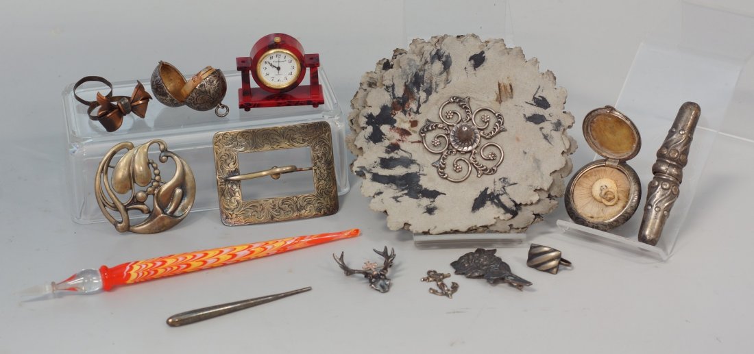 Interesting lot of silver and other items, to include;: Interesting lot of silver and other items, to include; an engraved belt buckle, Dane craft pin, a ball coin holder, a chatelaine powder puff holder, an earring, stags head pin with a touch of gold, a 