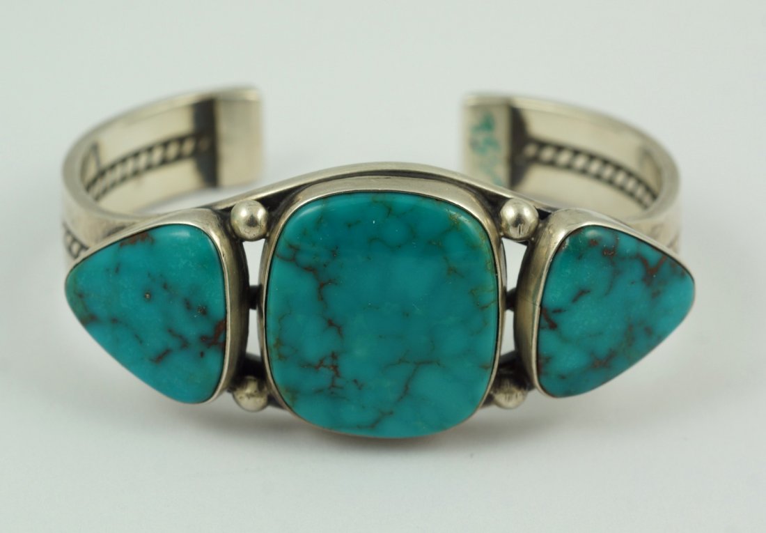 Sterling silver & turquoise traditional Navajo: Sterling silver & turquoise traditional Navajo bracelet, 2 oval & 1 round bezel turquoise stones, raindrops between stones, could be Fox or Blue Gem turquoise, marked "LD", could be Lowell Draper, , 2