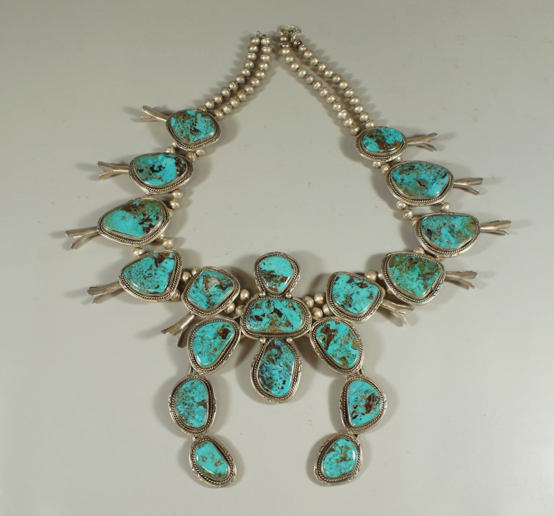 Silver & turquoise Navajo large squash blossom: Silver & turquoise Navajo large squash blossom necklace, 9 large bezel turquoise matrix stones, decorated with twisted wire & stamped half-round bar, 5 bezel turquoise blossoms on each side, 3 petal b