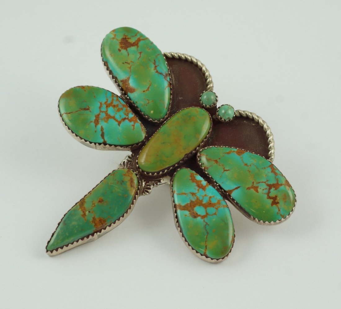 Brad Panteah Navajo traditional style turquoise bolo: Brad Panteah Navajo traditional style turquoise bolo tie slide, dragonfly of 6 saw-tooth bezel turquoise stones, 2 little stones for eyes, twisted wire for antenna, marked "BP", 2.5" x 2.5"