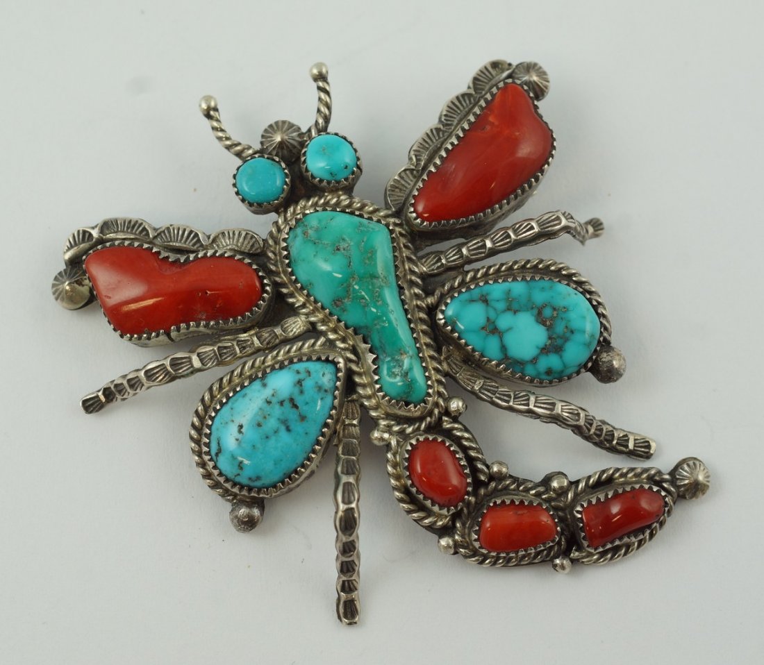 Sterling silver Navajo style 3 dimensional dragonfly: Sterling silver Navajo style 3 dimensional dragonfly pin, 5 bezel turquoise stones, 5 bezel coral stones, marked "LM", 2" x 2", .54 TO