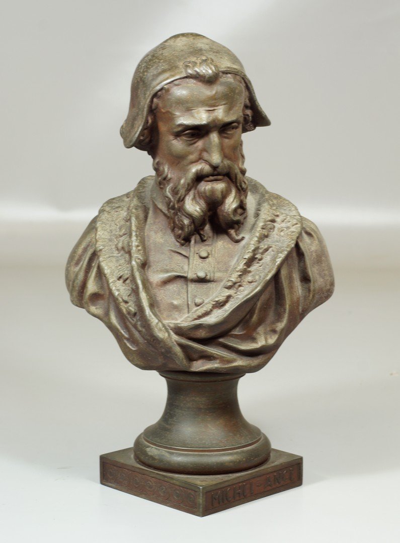 Spelter bust of a man, labeled E Guillemi, and plinth: Spelter bust of a man, labeled E Guillemi, and plinth marked Michel-ange, 19th Century, with hat, beard and collared coat on square plinth, approximately 13" high, 19th c.