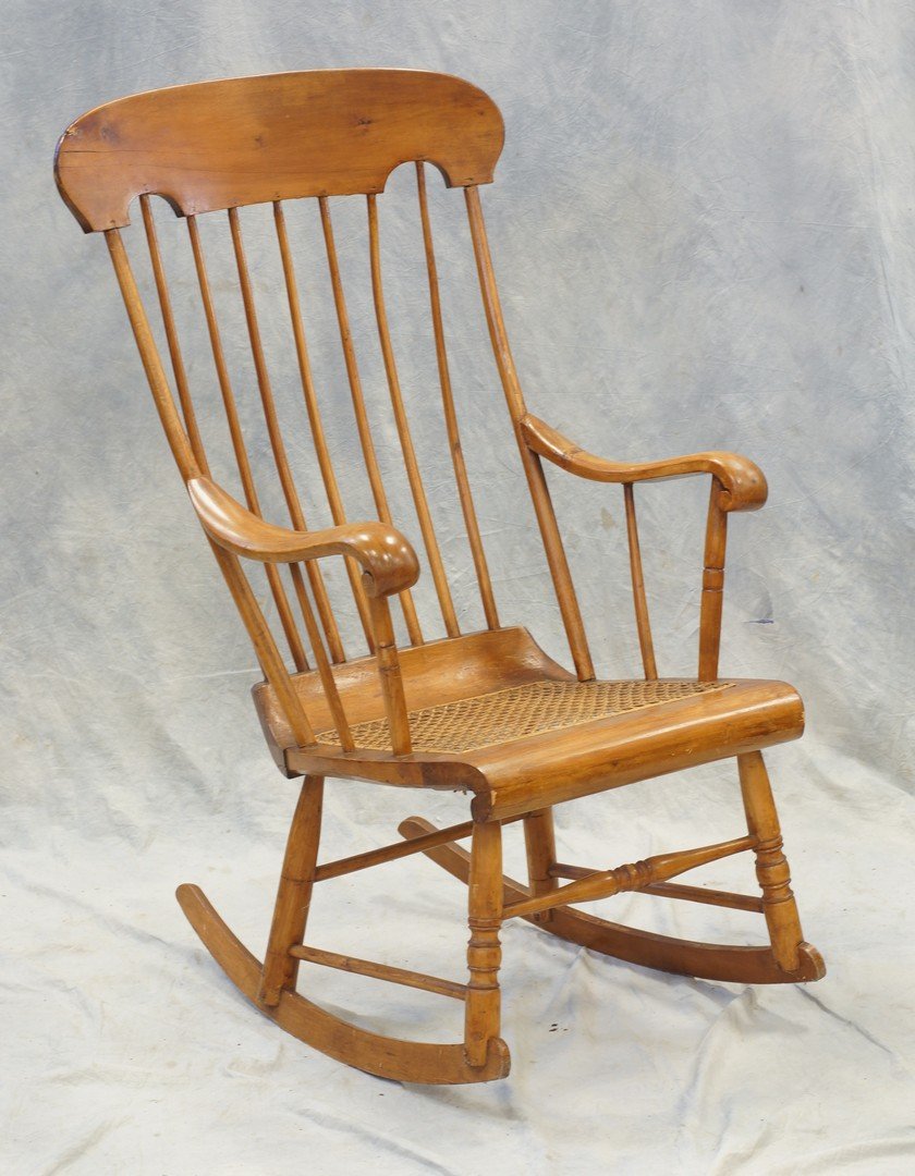 Spindle back caned seat rocking chair, 19th c, 42": Spindle back caned seat rocking chair, 19th c, 42" high.
