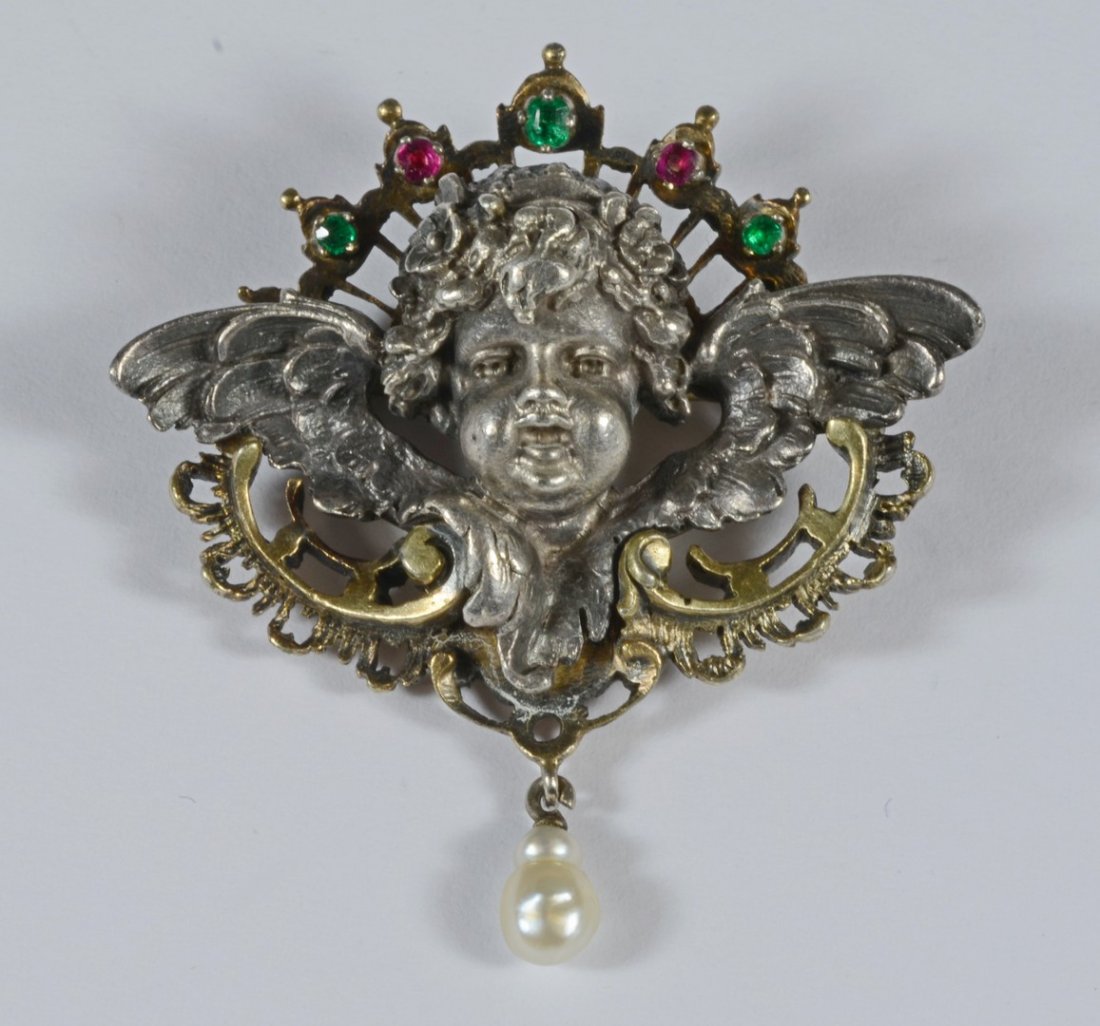 Unmarked silver winged cherub head pin, baroque pearl: Unmarked silver winged cherub head pin, baroque pearl drop, 5 red/green semi-precious stones across top, 1-5/8" w, 1-3/4" h, .57 Troy Oz