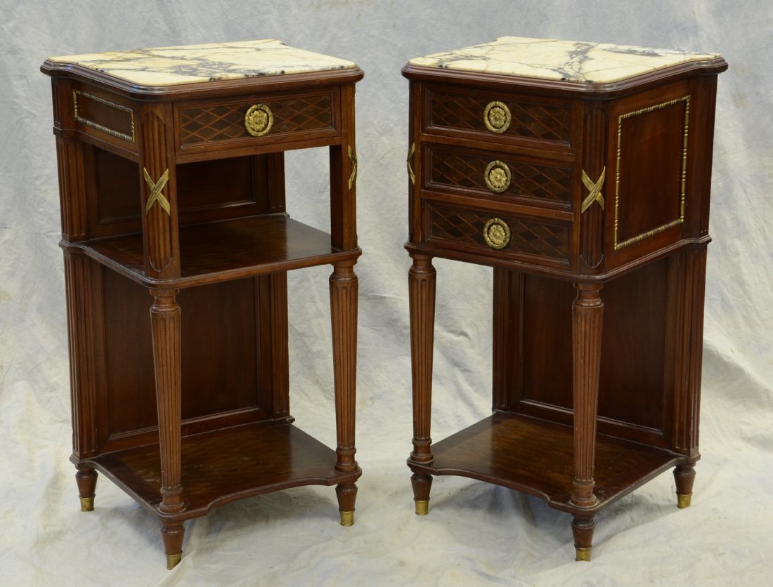 Pr Louis XVI style marble top commodes, ormolu mounts,: Pr Louis XVI style marble top commodes, ormolu mounts, latticework design inlay on drawer and door front, white and black veined marble tops, 19th c, 18" w, 32" h