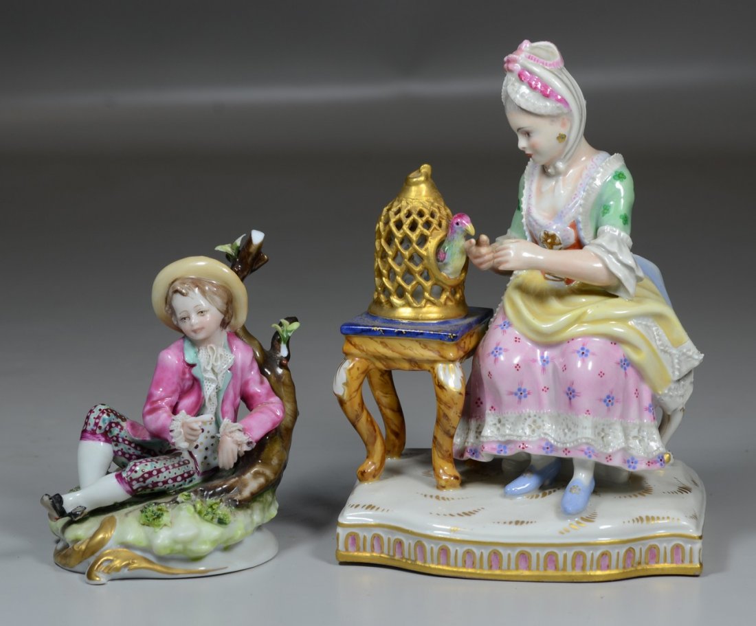 2 Capodimonte figurines, young girl with bird in cage: 2 Capodimonte figurines, young girl with bird in cage (no issues), young boy by tree (damage to tree, multiple losses), tallest 5 3/4"