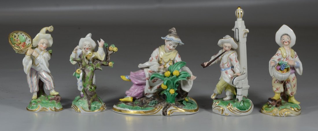 5 Nymphenburg chinois figures, man smoking, man by tree: 5 Nymphenburg chinois figures, man smoking, man by tree (losses), 2 figures with fruit baskets (both with losses), oval man with lemon tree, dated approximately 1951-62, tallest 5 3/4"